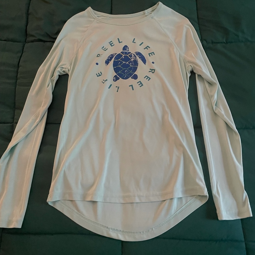 Sun resistant water shirt, can be worn in and out of water. Never worn before.